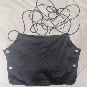small, black, open-back, satin crop top